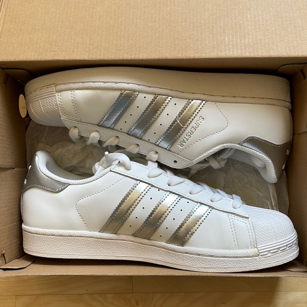 Women’s white and silver adidas og’s—size 7.5